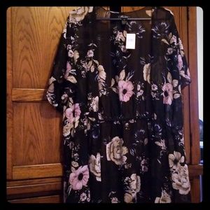 A sheer cover up for swim suits/ clothing